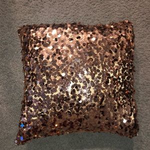 Rose gold accent pillow